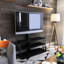 Meuble télé pivotant en verre noir pour téléviseur de 32 à 65 pouces avec construction et rangement pratiques