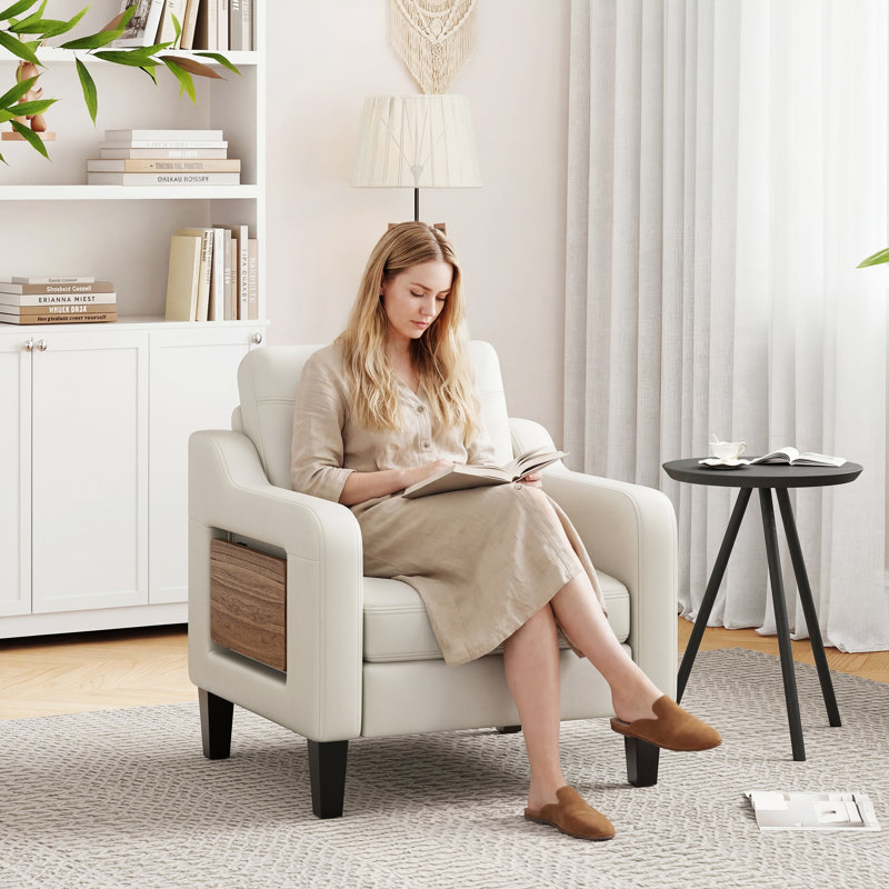 Fauteuil large en similicuir rembourré, Beige