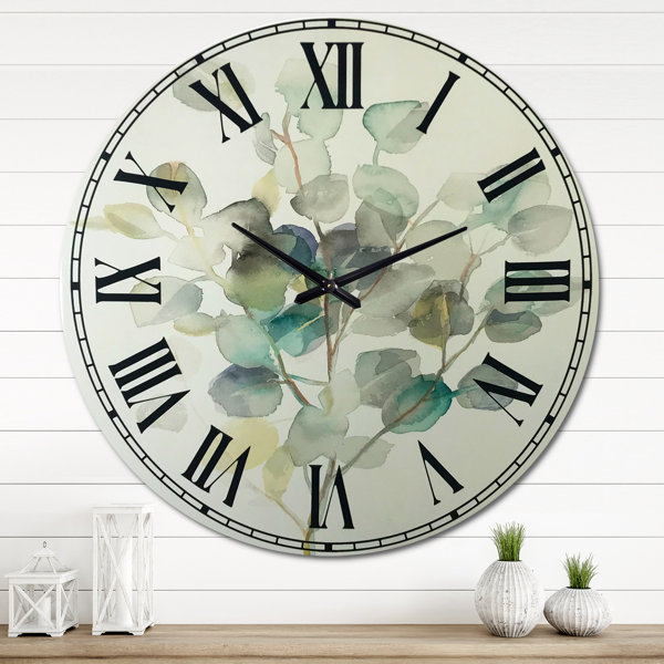 https://assets.wfcdn.com/im/31555705/resize-h600-w600%5Ecompr-r85/2271/227145209/Eucalyptus+leaves+I+-+Traditional+wall+clock.jpg