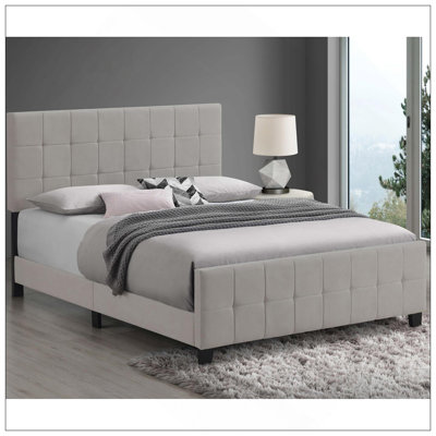 Beige Tufted Upholstered Panel Bed With Grid Design And Dark Brown Tapered Feet, Perfect For Modern Bedrooms.