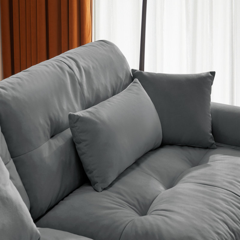 Canapé modulaire rembourré en velours avec repose-pieds