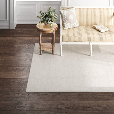 Mclellan Solid Colour Machine Made Power Loom Area Rug in Ivory