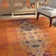 Hertzler Oriental Orange / Multi Area Rug