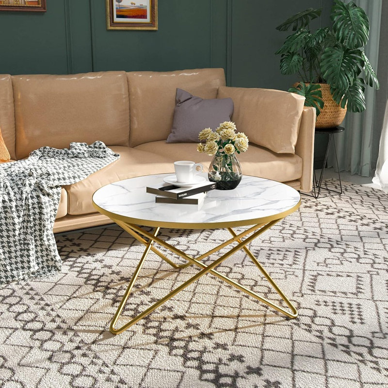 Table basse ronde avec plateau en faux marbre blanc