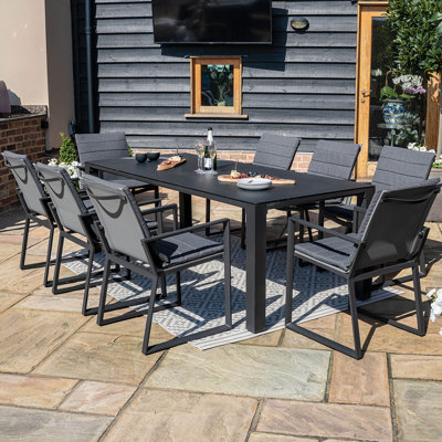 Damondre 8 - Person Patio Dining Set with Rectangular Table