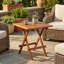 Petite table pliante en teck, finition huilée