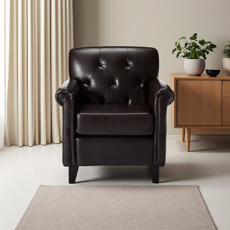 Fauteuil club capitonné