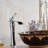Burgos Single Handle Bathroom Sink Faucet with Drain – Chrome Finish, Waterfall Spout, Deck-Mount Design