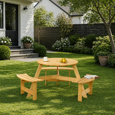 Table de pique-nique d'extérieur ronde avec bancs intégrés et trou pour parasol, idéale pour les repas sur la terrasse du jardin.