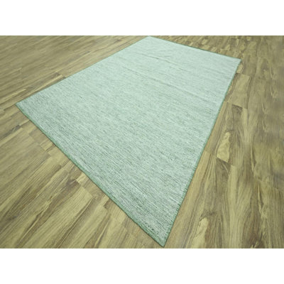 Tapis oriental vert 10 pi x 14 pi en laine nouée à la main, 100% laine, motif oxydé et patiné avec gauchissements apparents