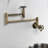 Kingston Brass Wendell Two-Handle 1-Hole Wall Mount Pot Filler Faucet with Knurled Handle-91111251