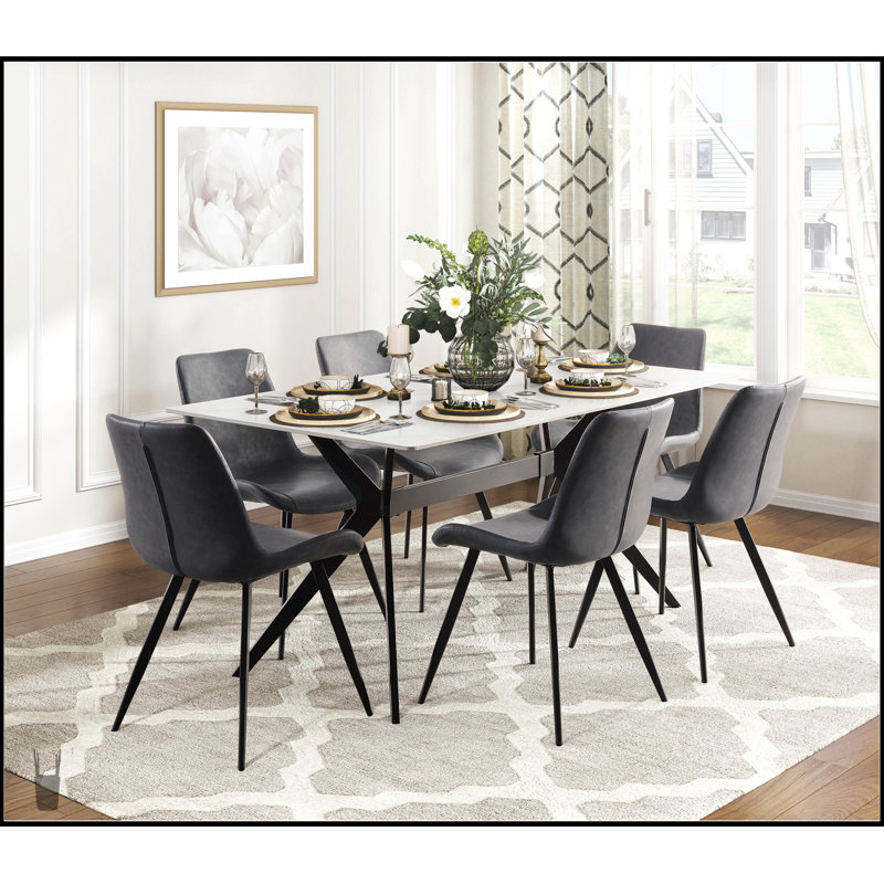 Ensemble de table de salle à manger moderne 5 pièces avec 4 chaises rembourrées, plateau en pierre frittée et pieds en métal noir pour les cuisines contemporaines