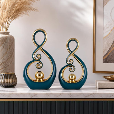 Ensemble de 2 sculptures en céramique vert et or, idéales pour la décoration intérieure. Sculptures d'art abstrait moderne, pièces maîtresses uniques pour table basse ou entrée, objets décoratifs pour salon, bureau ou salle à manger.