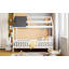 Lit simple en bois avec clôture