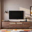 Meuble télé moderne avec tiroirs, espace de rangement et décoration en rotin entrelacé