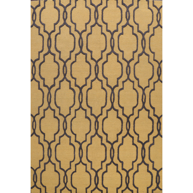 Tapis géométrique doré en laine touffeté à la main