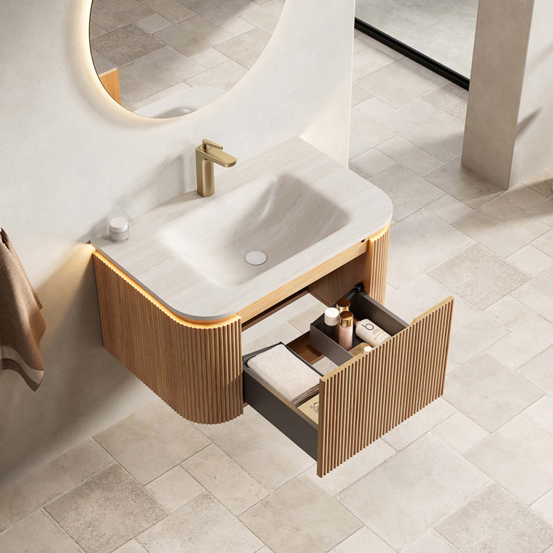 Meuble-lavabo suspendu avec lavabo intégré en pierre frittée et éclairage à détecteur de mouvement