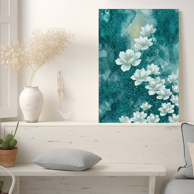 Tableau sur toile avec des fleurs de magnolia blanches aux bords dorés sur fond turquoise