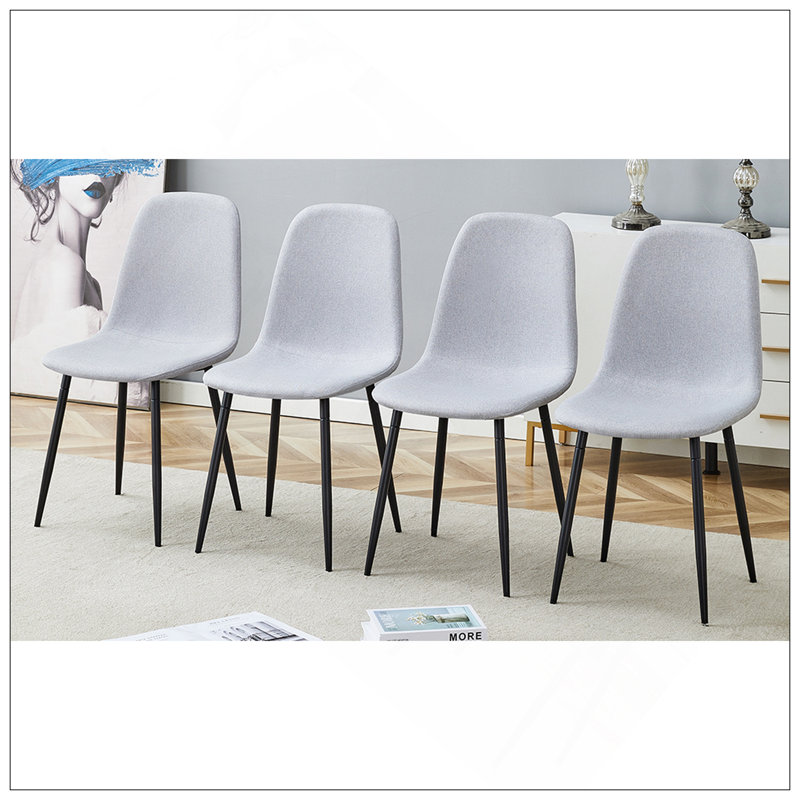 Confortable ensemble de chaises de salle à manger en lin et coton - Quatre pièces en gris clair. Siège et dossier intégrés, matériau en lin et coton, assorti à la maison moderne.