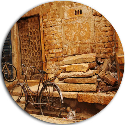 " Bicycle Against Brown Wall "