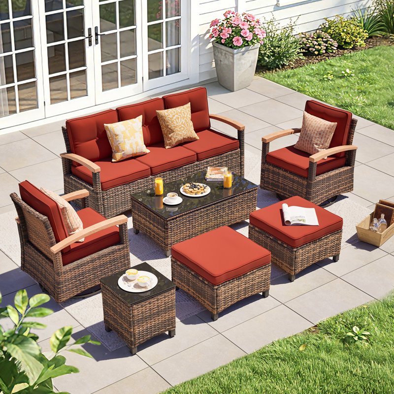 Ensemble de meubles de patio 7 pièces Meissalivve, ensembles de conversation pour patio en osier avec 2 accoudoirs pivotants en bois, 2 repose-pieds, canapé 3 places et table basse (rouge)