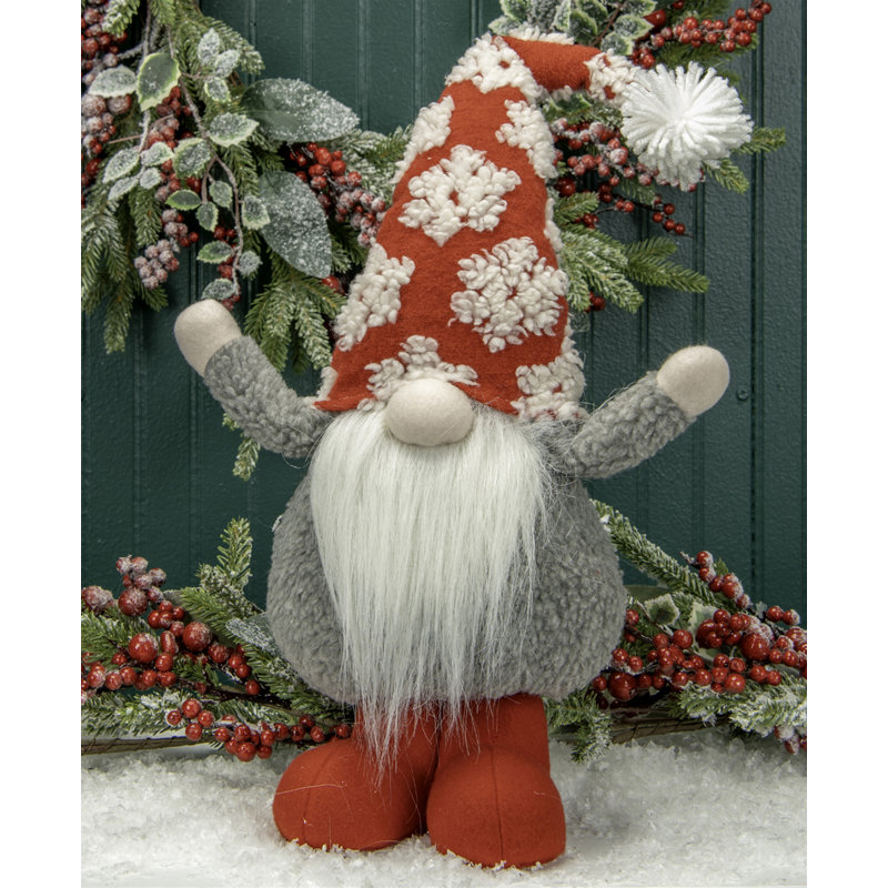 Gnome rond debout avec chapeau de flocon de neige