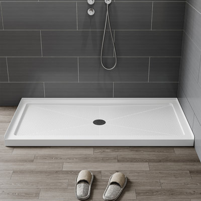 60" L x 30" W, acrylic shower pan with Center drain, slip-resistant design; includes drain assembly