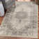 Tapis floral gris