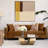Kaydae Glass Top Coffee Table with Sculptural Aluminum Base in Antique Brass