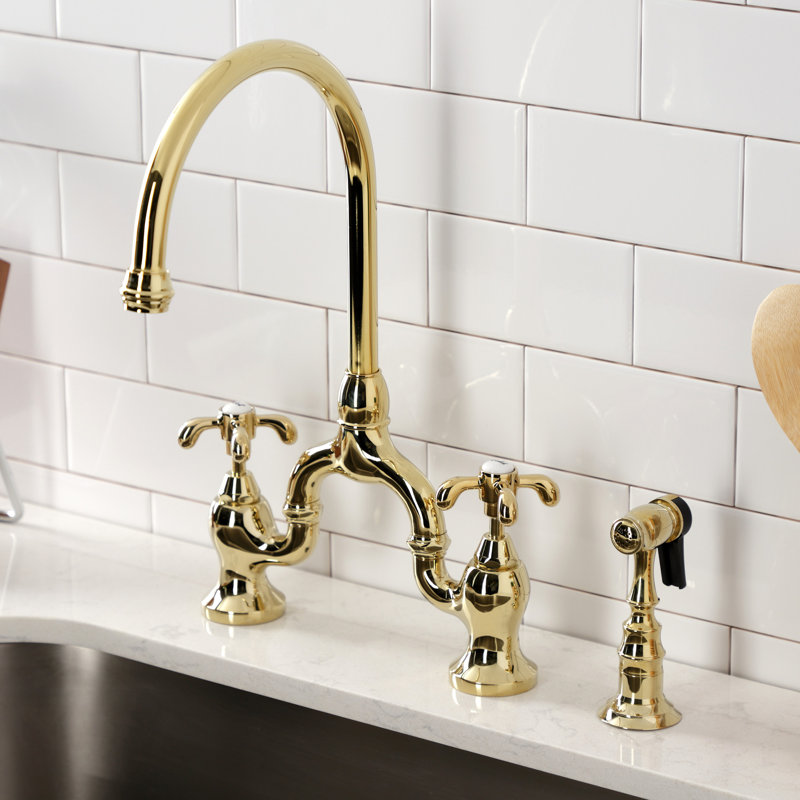 Kingston Brass French Country Two-Handle 3-Hole Deck Mount Bridge Kitchen Faucet with Brass Side Sprayer, Polished Brass