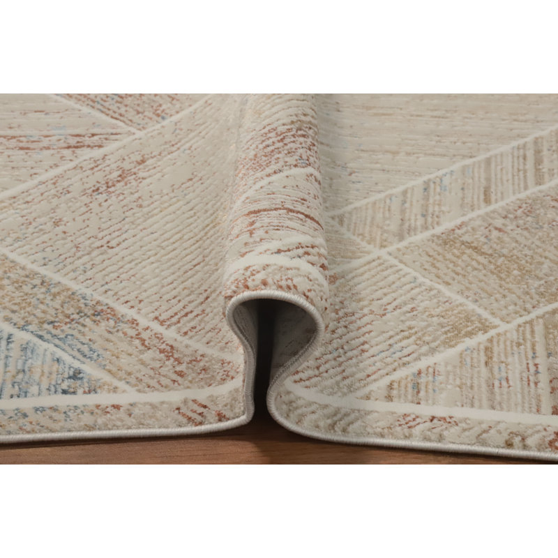 Tapis pastel à motif géométrique sophistiqué 5 x 7