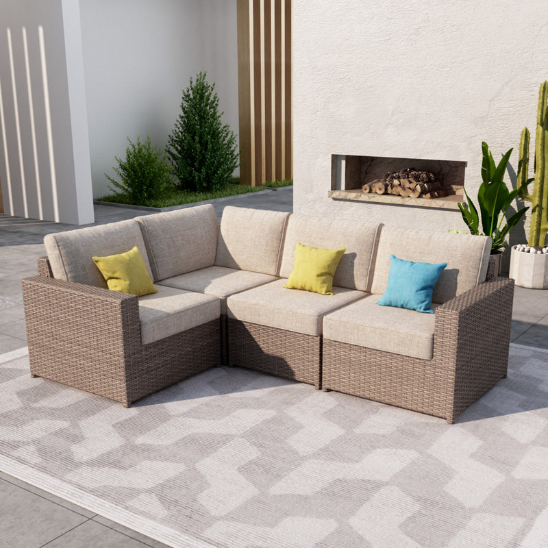 Ensemble de canapé de patio 4 pièces en osier avec coussins Amberson