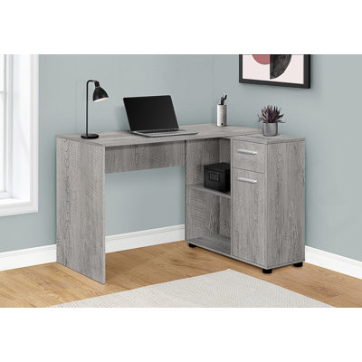 Bureau d'ordinateur de coin en L avec tiroirs de rangement pour le bureau à domicile moderne et l'utilisation par les étudiants.