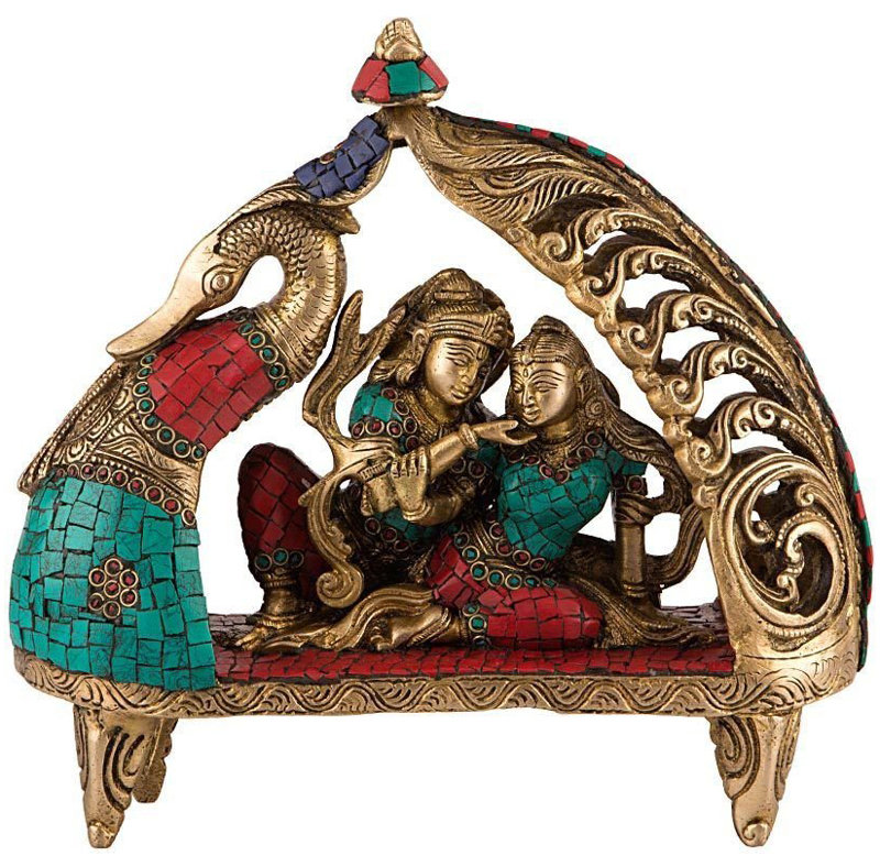 Radha Krishna assise sur un paon