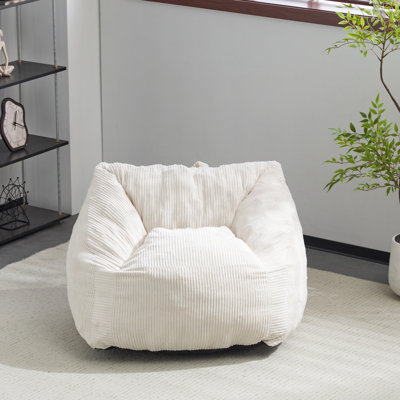 Petit fauteuil à billes avec fausse fourrure beige et rembourrage ergonomique
