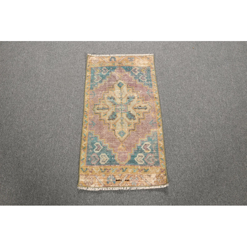 Paillasson de tapis turc authentique authentique dans des tons chauds avec un design artisanal traditionnel