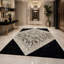 Tapis patchwork en cuir de vache véritable noir et blanc-561637751