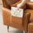 Mid-Century Modern Black Leatherette Armchair With Gold Trimmed Metal Legs And Side Pocket-1809113809