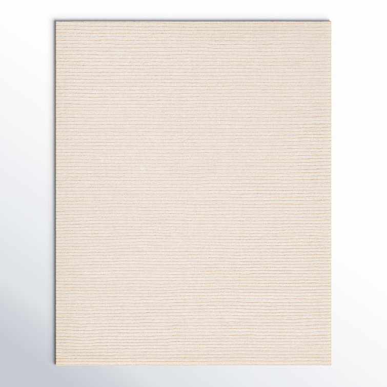 Guiness Solid Color Hand Loomed Wool Area Rug in Beige