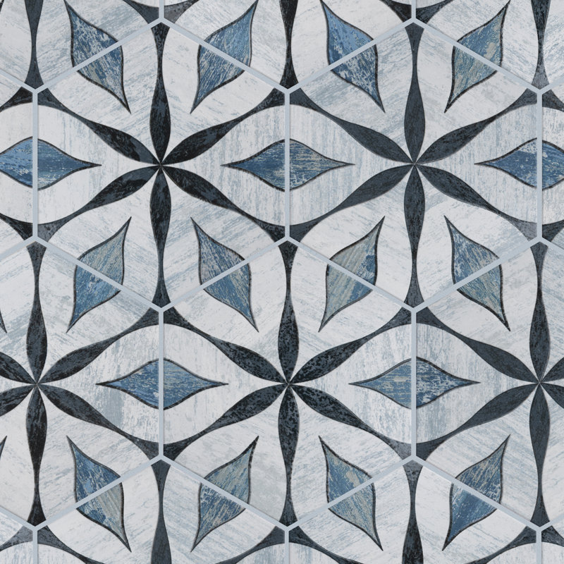 Hexagonal porcelain tile in blue and grey with a floral-inspired geometric pattern.