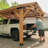 Backyard Discovery Norwood 24' x 12' Cedar Wood Outdoor Patio Gazebo with Hardtop Galvanized Steel Peak Roof and PowerPort
