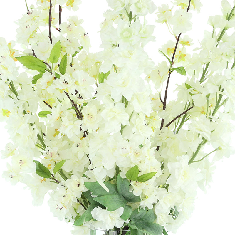 Delphinium And Cherry Blossom In Glass Vase