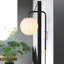 Lampe murale moderne avec globe rond noir et or avec interrupteur