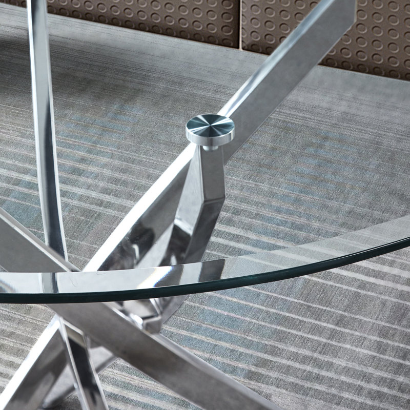 Table de salle à manger ronde en verre trempé transparent avec base sculpturale en acier inoxydable argenté, 36 pouces de diamètre, pouvant accueillir jusqu'à quatre bases angulaires à finition moderne et pieds niveleurs, confortable pour