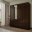 Armoire-penderie autoportante à 4 portes de 180 cm de hauteur, avec garde-robe, étagères et tiroirs, idéale pour le rangement dans la chambre.