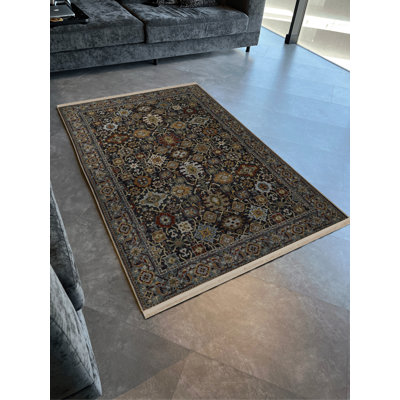 Tapis décoratif multicolore foncé à motif floral et floral