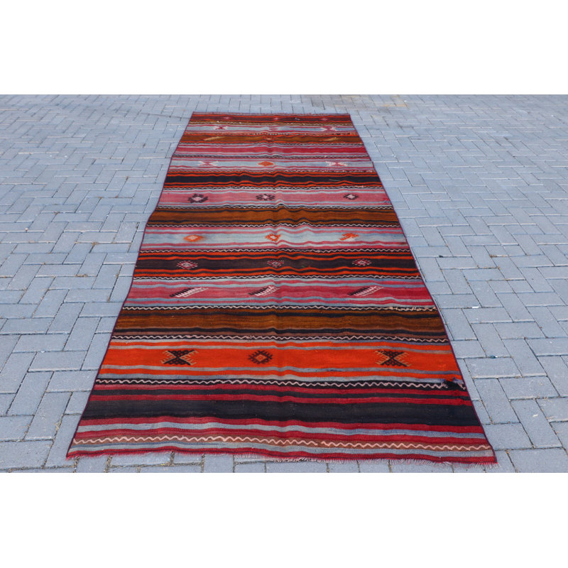 Tapis turc rétro vintage tissé à la main en rayures orange et brunes, idéal pour un décor bohème comme tapis de sol rustique