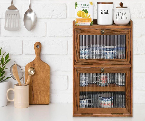 Tea Leaf Essentials Immunity Defense with sugar and cream on top of a cabinet.