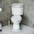 The Renovators Supply Inc. 45.5 Gallons GPF Elongated Chair Height Floor Mounted Corner Toilet (Seat Included)-73064074