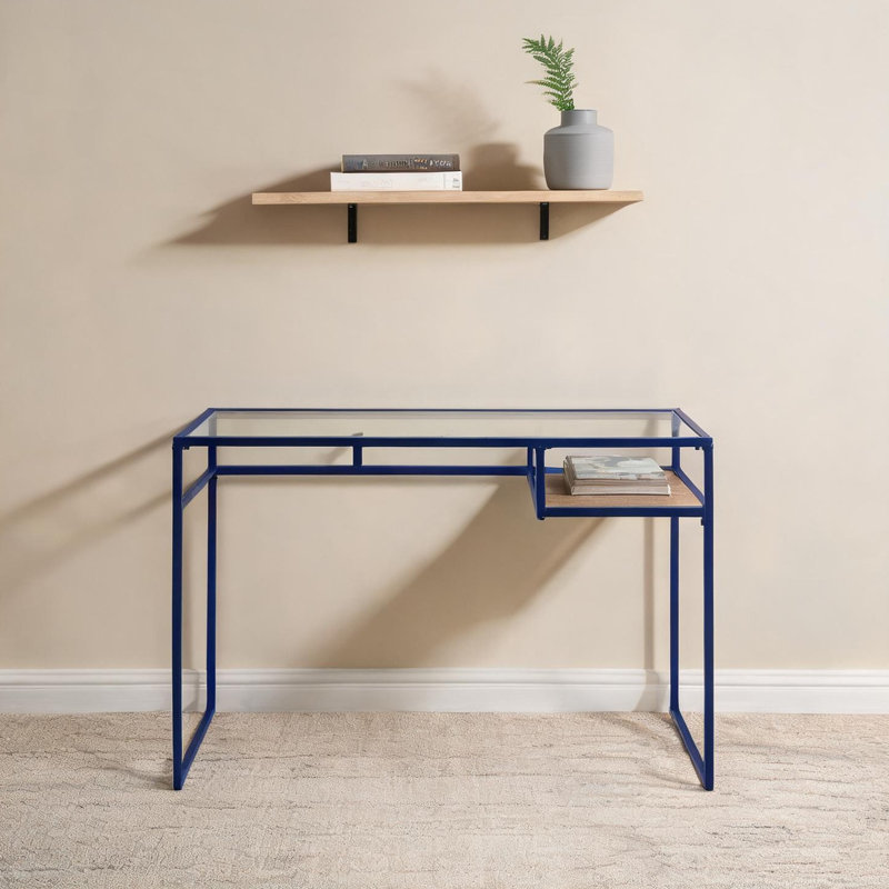 Bureau d'écriture à plateau en verre transparent avec base de traîneau en métal bleu et tablette ouverte pour les espaces de travail modernes